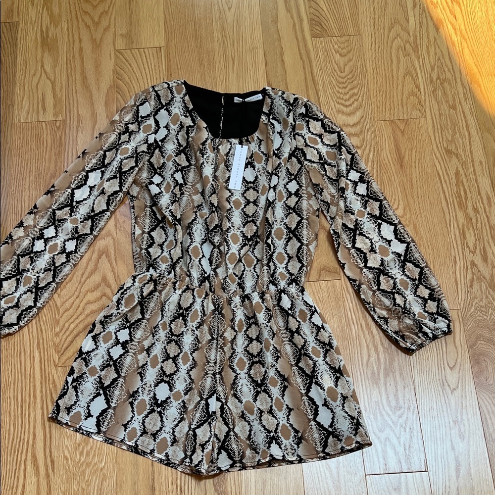 New! Three Eighty two small snake print long sleeve romper.